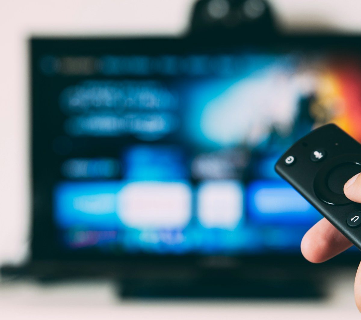 turned-on flat screen television